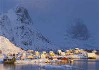 Small fishing village on Lofoten Islands in winter by Baard Loeken, Nordnorsk Reiseliv